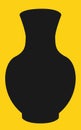 One single flower pot vase silhouette against a yellow backdrop Royalty Free Stock Photo
