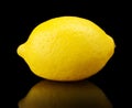 One single lemon isolated on black