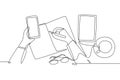 One single line drawing of finger hand touch the smartphone screen with glasses, book, tablet and a cup of coffee on work desk. Royalty Free Stock Photo