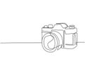 One single line drawing of old retro analog slr camera with telephoto lens. Vintage classic photography equipment concept Royalty Free Stock Photo