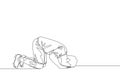 One single line drawing of sporty football player celebrates his goal with sujud of gratitude gesture at field