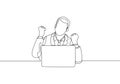 One single line drawing of young happy business man sitting on chair and open a laptop to read business contract agreement Royalty Free Stock Photo