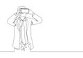 One single line drawing of young happy gamer businessman looking digital visual data using virtual reality goggles