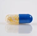 One single pill isolated Royalty Free Stock Photo