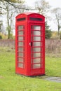 One Single Red Telephone Box Traditional Old Dial Up Pay With Coins To Call Royalty Free Stock Photo