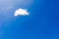 one single small fluffy white cloud Royalty Free Stock Photo