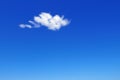 one single small fluffy white cloud Royalty Free Stock Photo