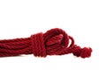 One skein of jute rope six millimeters for Japanese bondage and shibari, painted in red on a white background Royalty Free Stock Photo