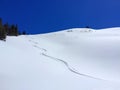 One Skied Snow Track on a Mountain with Clear Skies