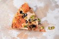 One slice of supreme pizza Royalty Free Stock Photo