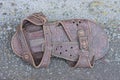 one small brown leather summer sandal Royalty Free Stock Photo