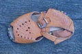 one small brown leather summer sandal Royalty Free Stock Photo