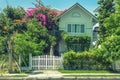 One Small cozy two-storey house with p trees