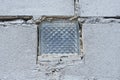 one small dirty old square window