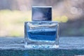 one small glass bottle with blue perfume Royalty Free Stock Photo