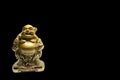 One small golden figurine of buddha