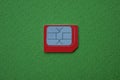 One small gray red phone sim card Royalty Free Stock Photo