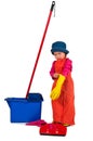 One small little girl cleaning with mop.
