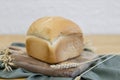 One white round bread with wheat fiber on the table. Royalty Free Stock Photo