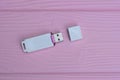 one small white plastic closed mobile flash drive