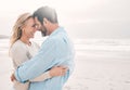 One smile is all it takes. a mature couple spending a day at the beach. Royalty Free Stock Photo