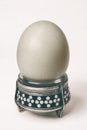 One soft-boiled egg on a beautiful stand eggcup English breakfast close-up of a white background