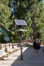 One solar panel in a pole near a modern house in the middle of a forest in Isla Victoria Royalty Free Stock Photo