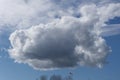 A solitary low level cloud on a bright spring day. Royalty Free Stock Photo