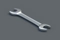 One spanner on black background. Metal wrench in workshop. Repair and maintenance tool Royalty Free Stock Photo
