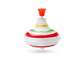 One spinning top in motion on white background. Toy whirligig