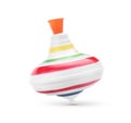 One spinning top in motion on white background. Toy whirligig