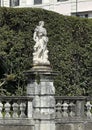 One of 12 statues of mythical divinities and allegorical figures on the front of the Italian garden of Villa Carlotta.