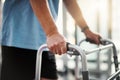 One step at a time. Closeup shot of a senior man using a walker. Royalty Free Stock Photo