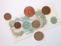 One Sterling Pound note, circa 1970, and coins Royalty Free Stock Photo