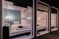 One-story bedroom area is combined inside a modern capsule hotel