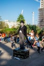 One of the street performers dressed up as Charlie Chaplin near Jubilee gardens and London Eye Observation Wheel