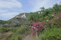 Nha Trang, Viet Nam - 13 July,2015: Beautiful landscape with colorful Swing Carousel game in amusement park with green mountain Royalty Free Stock Photo