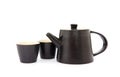 One teapot and two tea cups on white background Royalty Free Stock Photo