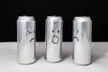 One tells others how they beat him, about incident Concept Aluminum cans. Drawn emotions. Sadness angry and indignation Royalty Free Stock Photo