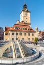 Fountain in the central square of the old Brasov in Romania Royalty Free Stock Photo