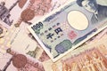 A Japanese yen bank note with Egyptian one pound bank notes Royalty Free Stock Photo