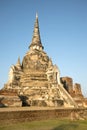 One of the three ancient stupas of the Buddhist temple Wat Phra Si Sanphet in the rays of the setting sun. Ayutthaya, Thailand