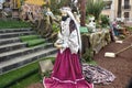 One of the three holy kings in the biblical Christmas story in life-size with magnificent velvet robe