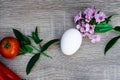 one tomato and one egg, violet, mint, objective photography