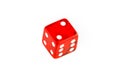 One transparent red die