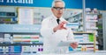 This one is trending right now. a male pharmacist working in a chemist. Royalty Free Stock Photo