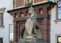 One of two Lion statues holding a shield, on either side of the Swiss Gate Schweizertor, Hofburg Palace, Vienna Royalty Free Stock Photo