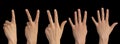 One, two, three, four, five fingers on a hand on a black background