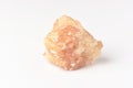 One uncut and rough Sunstone crystal,quartz on white