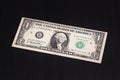 One United States Dollar on dark background. 1 US Dollar banknote